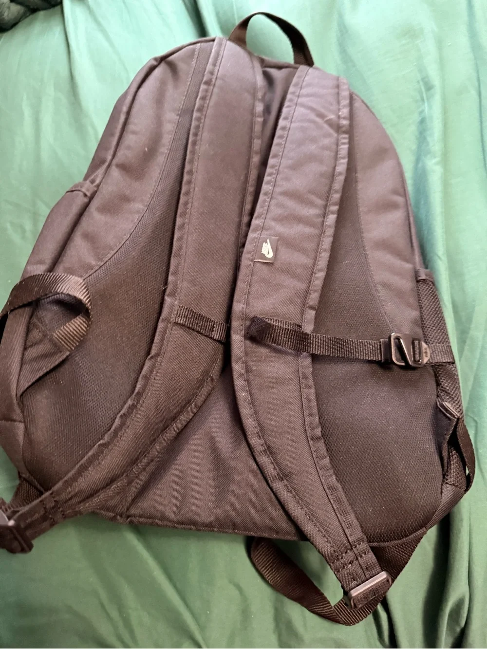 Nike Black Backpack with White Graphic and Elastic Bungee Cord